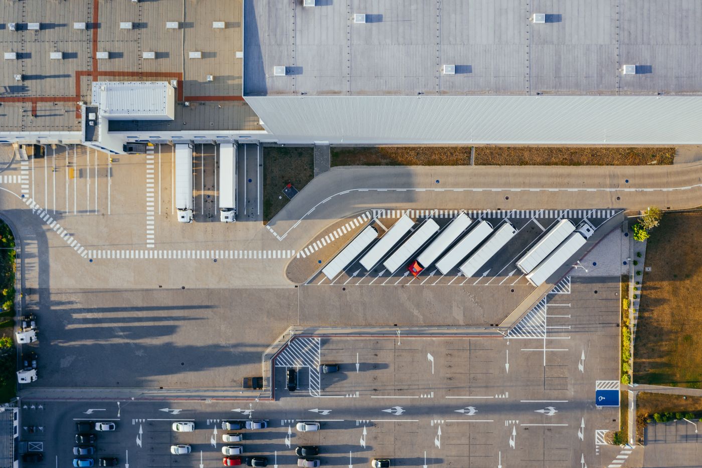 XPO distribution centre with delivery lorries at the loading docks